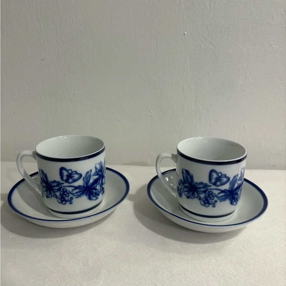 Williams Sonoma blue and white butterfly mugs and saucers